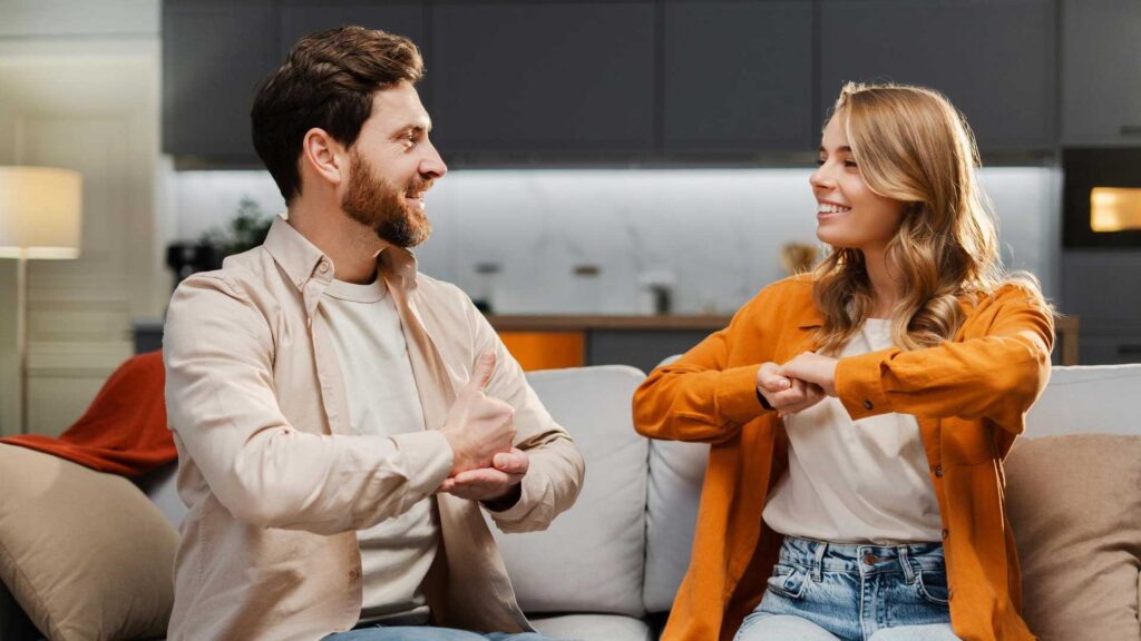 Young Couple Translator Speaking with Sign Language