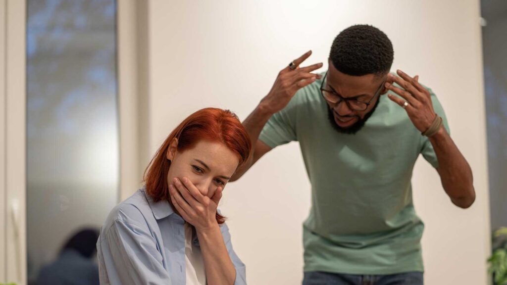 Angry African Man Blaming and Shaming Wife at Home