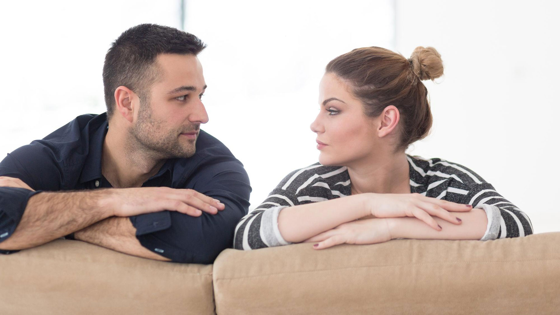 A couple talking seriously about their life.