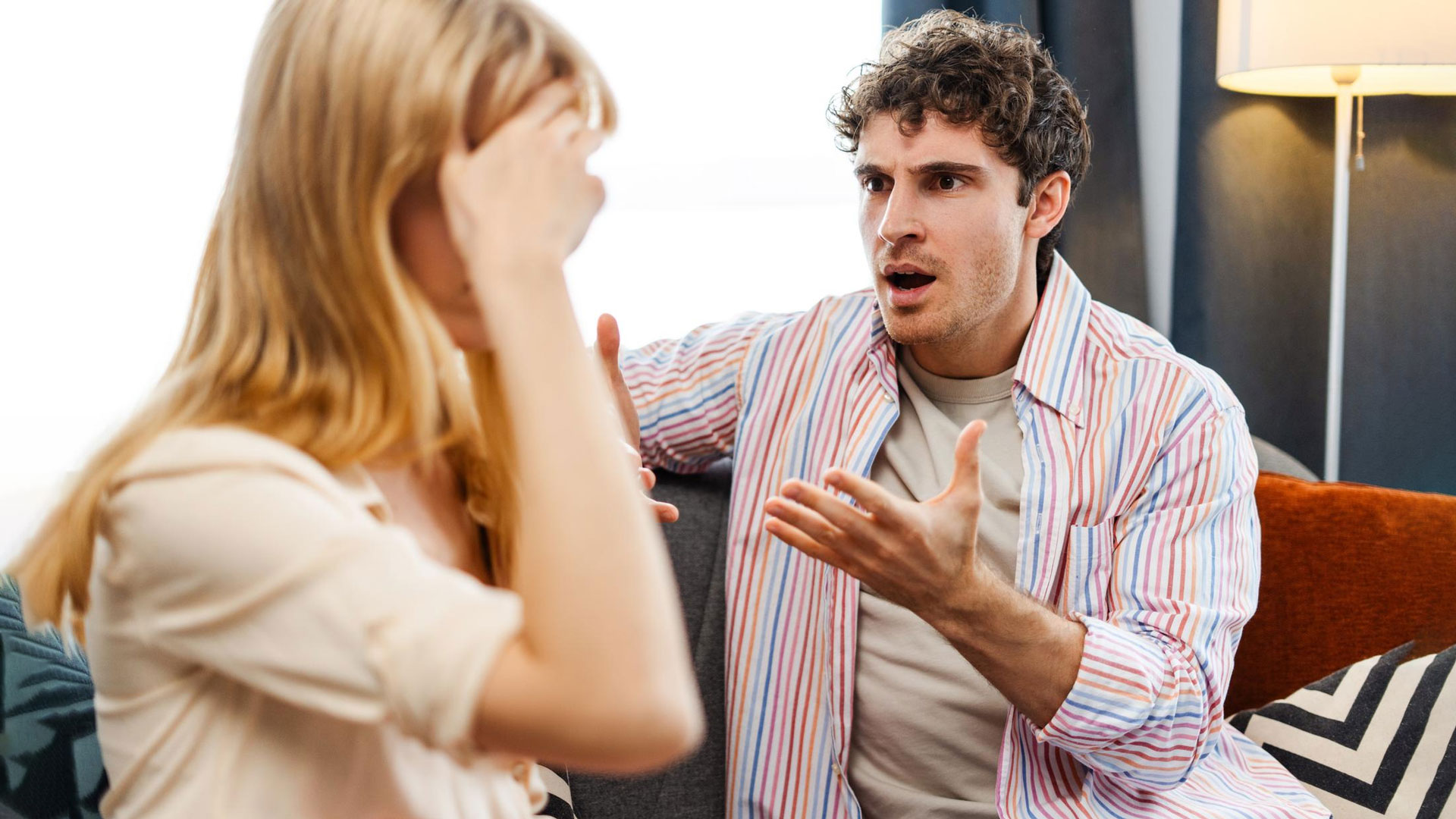 Husband yelling at his wife.